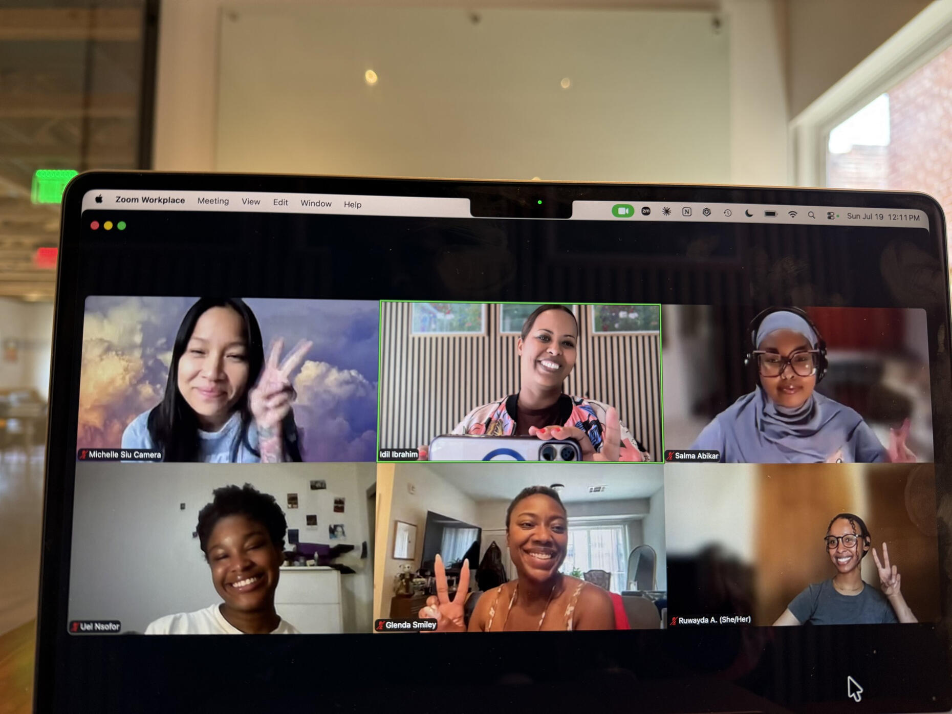Idil Ibrahim and five filmmakers together on a laptop screen during a live First Frame workshop session on Zoom.